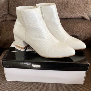 White heeled booties